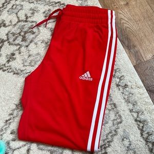 Adidas Primegreen track pants in red and white, size small